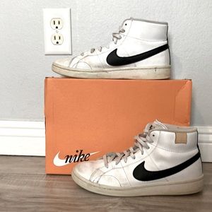 White and black Nike Court Royale.